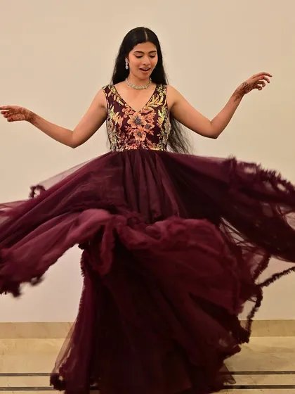 A joyful, twirling motion that shows the beautiful volume of the gown. The makeup stays perfectly in place, looking fresh and elegant.