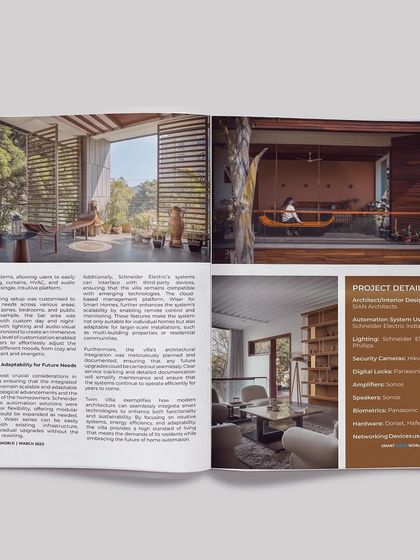 A magazine spread from Smart Home World featuring Twin Villa. The article highlights the home's seamless indoor-outdoor connection and its integration of advanced smart home automation.