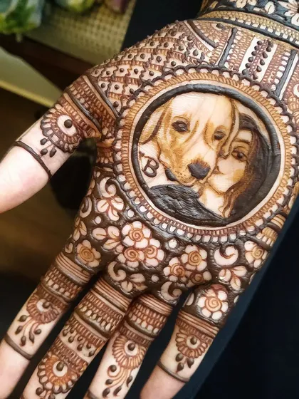 Our furry friends are family, and it was a joy to create this portrait of a bride with her beloved dog, Bruno. This piece is a perfect example of how we can include any loved one in your mehndi, creating a memory that lasts forever.