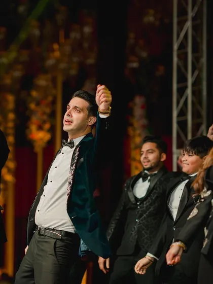 The men of the family showing off their moves. I make sure the guys have their own swag-filled moments on stage.
