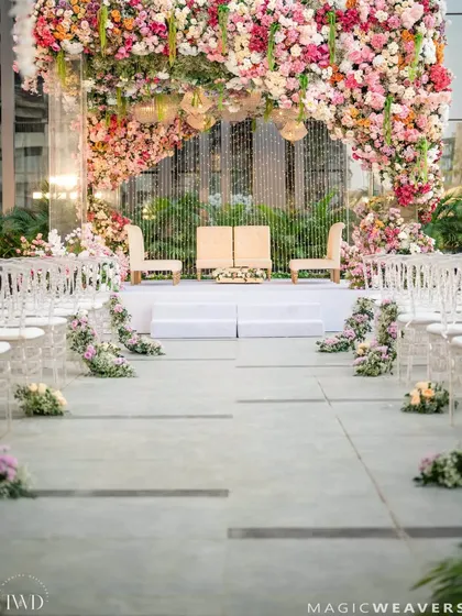 We love to create signature "wow" moments that your guests will talk about for years. This upside down garden, with thousands of flowers suspended overhead, transformed a simple ceiling into an enchanted floral sky for the wedding ceremony.
