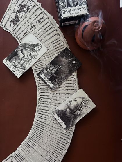 A tarot spread that offered a lesson on our relationship with our parents. The cards remind us to stop idealizing them and start accepting their humanity, which in turn allows us to accept ourselves more fully.