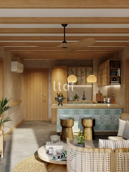 We immersed this living space in rustic elegance to curate a warm, earthy aesthetic. From the exposed wooden rafters in the ceiling to the cane accents in the furniture and patterned tile on the bar, every element contributes to a narrative of timeless, organic charm.