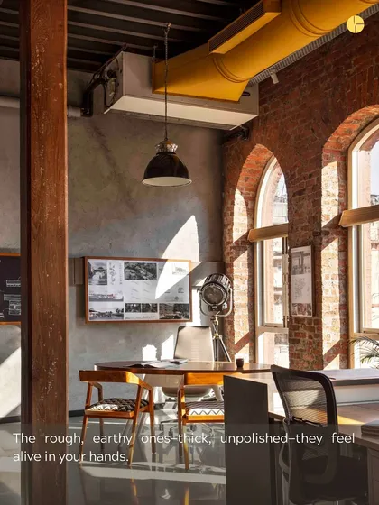 The rough, earthy textures of materials like brick feel alive in your hands. In our studio, these materials are not just finishes; they are an integral part of the daily experience.