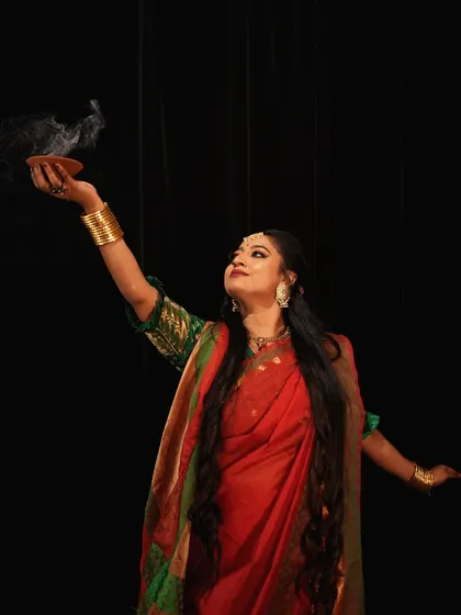 A powerful pose with a diya from my Shubho Mahalaya shoot, symbolizing the welcoming of the goddess.
