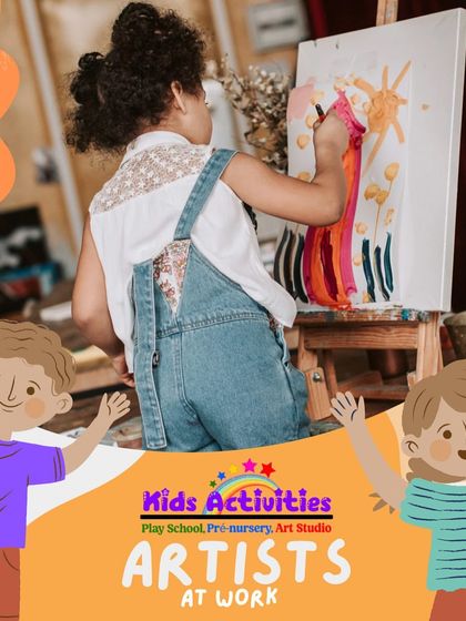 Artists at work. This candid shot captures a young student painting on an easel, completely absorbed in her creative process. Our studio is a bustling hub of imagination and artistic exploration.