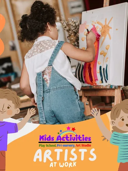 Artists at work. This candid shot captures a young student painting on an easel, completely absorbed in her creative process. Our studio is a bustling hub of imagination and artistic exploration.