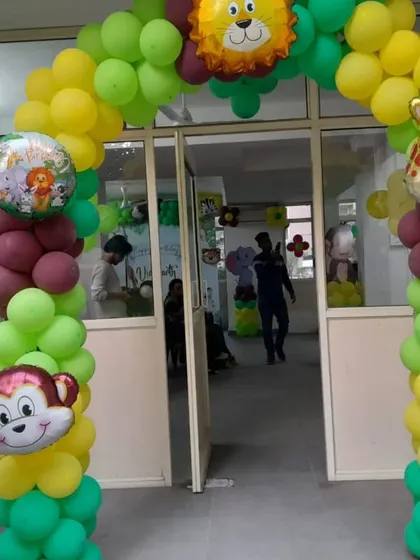 A wild welcome with our jungle theme balloon arch. Decorated with friendly animal foil balloons like a lion, giraffe, and monkey, it's the perfect entrance for a safari adventure.