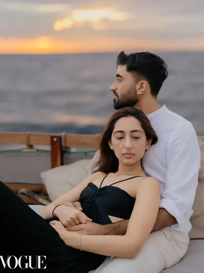 A quiet moment for Dhwani and Vishal on a boat at sunset in Zanzibar. This intimate pre-wedding photo captures the calm and deep connection they share, away from all the wedding madness.
