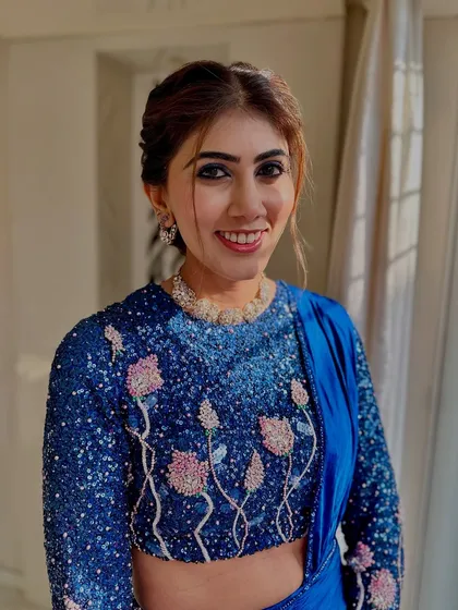 A beautiful portrait showing the soft glam makeup that enhances her features without overpowering her.
