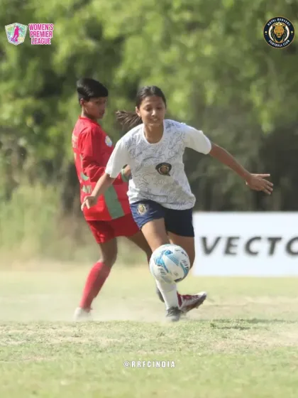 Kicking up dust, our player makes a sharp turn to evade a defender, showcasing agility and quick thinking on the ball.
