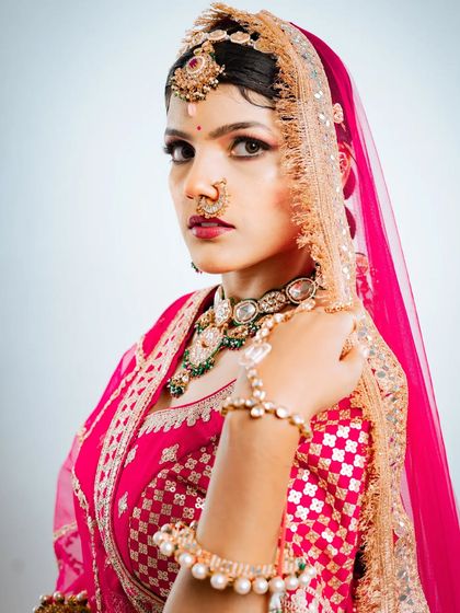 This image highlights the hathphool, a beautiful hand ornament that adds grace to a bride's hands. It's all part of the complete rental set.