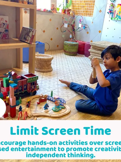 A boy lost in his own world of play with a wooden train set. I emphasize hands-on activities to limit screen time and foster imagination.