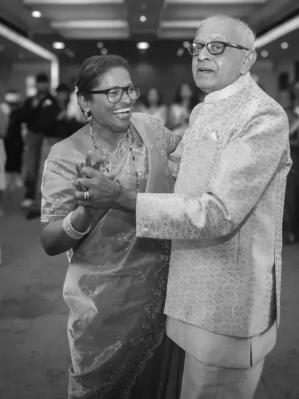A black and white shot of the happy couple dancing at their 50th-anniversary party. The timeless quality of the photo matches their enduring love.
