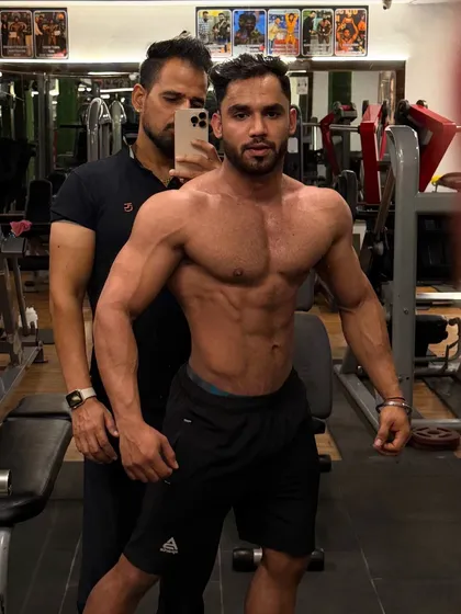 Posing during the gain phase helps to see how the new muscle is developing and where we need to focus.