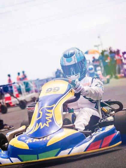 Our driver in the number 99 kart, focused and ready.
