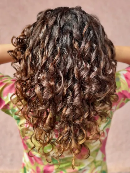 The back of the 'Chocolate Swirl' curls, showing the rich, multi-tonal brown color.
