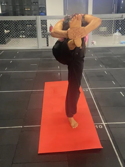 A standing balancing pose that involves a bind. This requires focus, hip flexibility, and a strong standing leg.