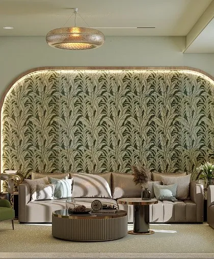 For a bolder look, I used a botanical wallpaper within the arched niche to create a stunning feature wall. This design choice brings life and personality to the living room, complementing the earthy tones of the furniture.