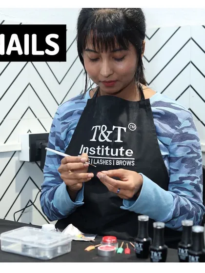 A student in our institute getting hands-on practice. We ensure you learn by doing, working with professional-grade products to build real-world skills for your nail technician career.