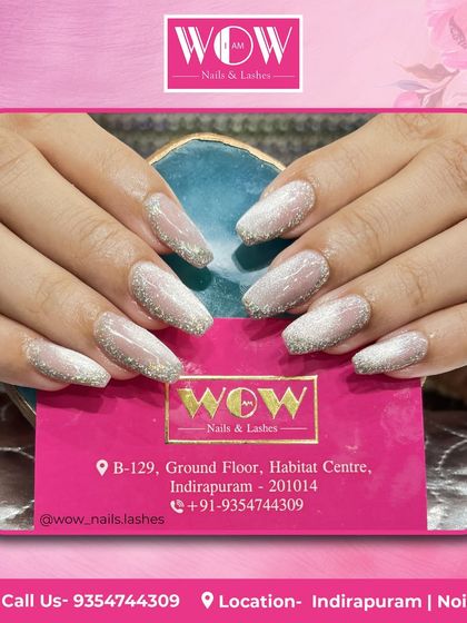 A soft and subtle glitter ombré on square-shaped nails. This is a perfect example of how glitter can be used for an elegant and understated look.