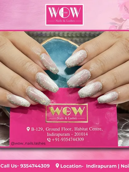 A soft and subtle glitter ombré on square-shaped nails. This is a perfect example of how glitter can be used for an elegant and understated look.