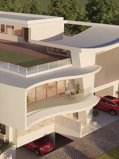 This residence showcases our use of bold, sculptural forms. The sweeping curves of the facade and cantilevered balconies create a unique architectural identity, while the white palette and glass railings maintain a feeling of lightness and openness.