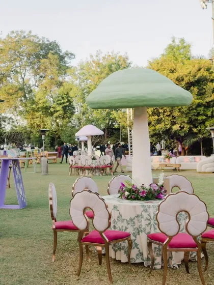 Even the seating was part of the fairytale. I arranged tables under giant decorative mushrooms, with whimsical chairs and floral centerpieces, fully immersing guests in the Wonderland theme.