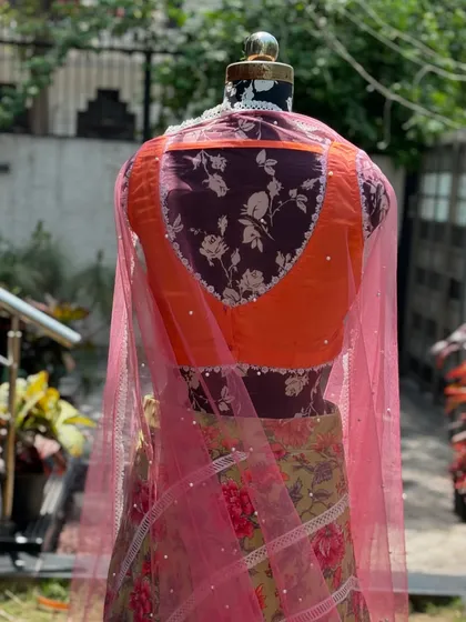 The back of the lehenga set, showing the beautiful color combination.
