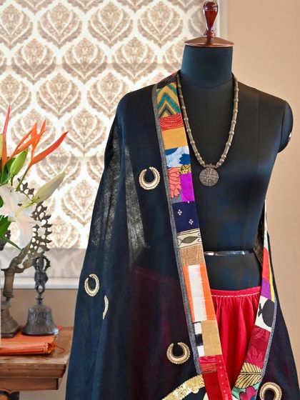 A different styling of the linen dupatta, showing the patchwork border and Zardozi embroidery. Each element is carefully chosen to create a balanced and elegant composition.