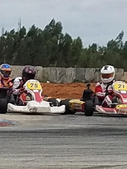 Intense wheel-to-wheel action between our drivers during a Rotax Indian Championship race, showcasing their competitive racecraft.