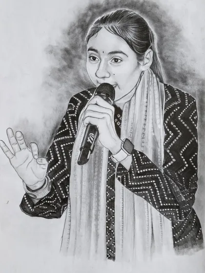 A portrait of Rajasthani singer Anita Jangid, done in graphite pencil. I wanted to capture her in her element, focusing on her expression while singing.