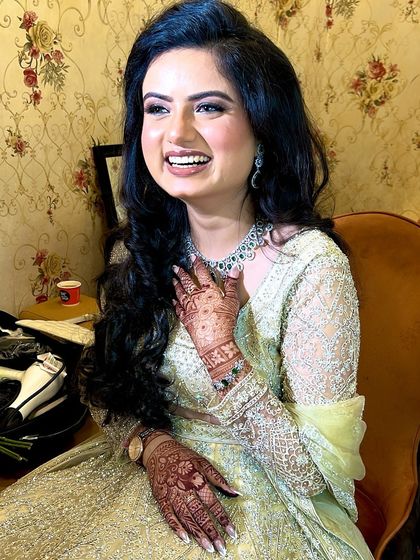 A happy, candid moment from Tanishka's engagement. Her joyful laugh shows how confident and beautiful she feels.