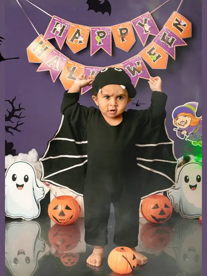 A mighty roar from a little bat. We love capturing the fun and imaginative play during our Halloween photoshoots.