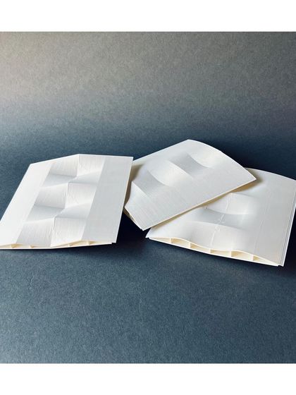 These 3D-printed iterations explore different roof forms for a project. Model making allows us to quickly test and refine complex geometries before construction.