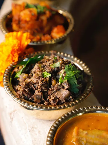 A closer look at the Banana Blossom Thoran. You can see the texture of the finely chopped blossom and lentils, a dish that is both satisfying and a true taste of local Kerala ingredients.