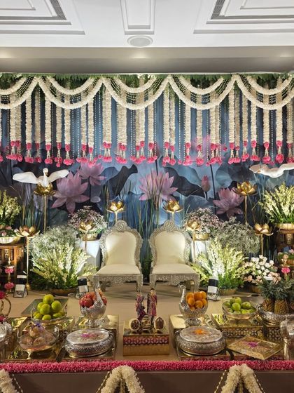 A close-up of the central seating and offerings on the lotus pond stage.