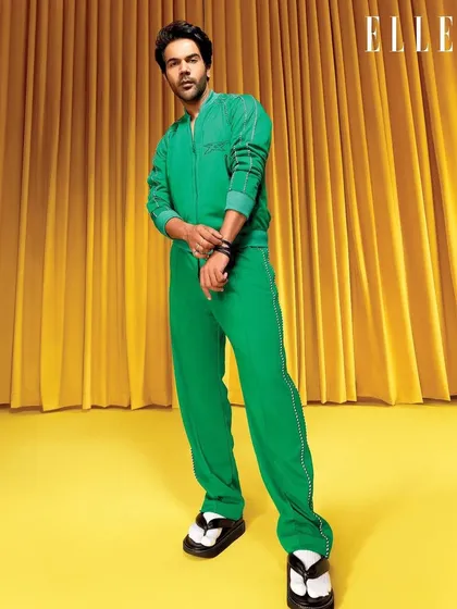 Experimenting with color for Rajkummar Rao's ELLE India shoot. This vibrant green Onitsuka Tiger tracksuit, paired with statement slides, creates a bold and playful fashion moment.