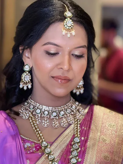 A close-up of this engagement look shows the detail in the soft brown smokey eye and the smooth, natural-looking skin finish. I focus on creating makeup that is beautiful both in person and on camera.