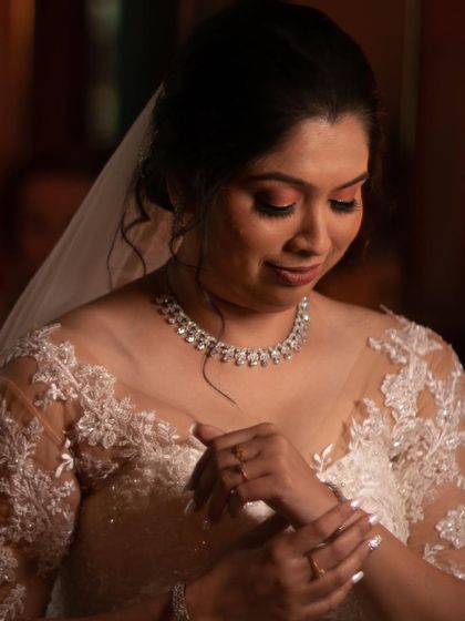 Just can't get enough of this lovely makeover. A close-up of our Christian bride, showcasing the soft pink and brown tones on her eyes and her radiant complexion.