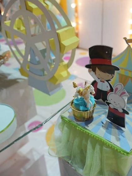 Tiny details bring a theme to life. This miniature circus tent and magician centerpiece was a whimsical addition to the tablescape.