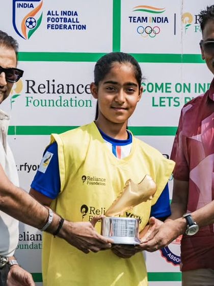 An individual award being presented to one of our standout players at the Reliance Foundation tournament, recognizing her exceptional performance.