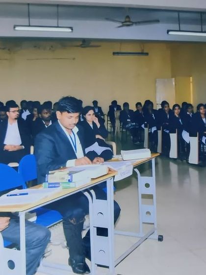 Here is a wider view of a moot court competition I was judging. You can see the participants presenting their arguments, a familiar scene that brings back many memories of my own time as a competitor.
