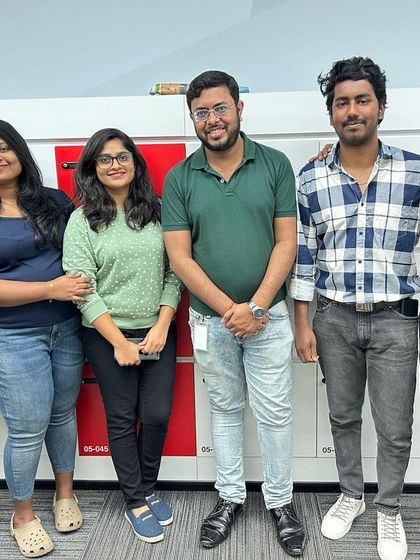 Posing with a smaller group of my colleagues. Close collaboration is key to solving complex tax issues and forecasting cash flow for startups and freelancers.