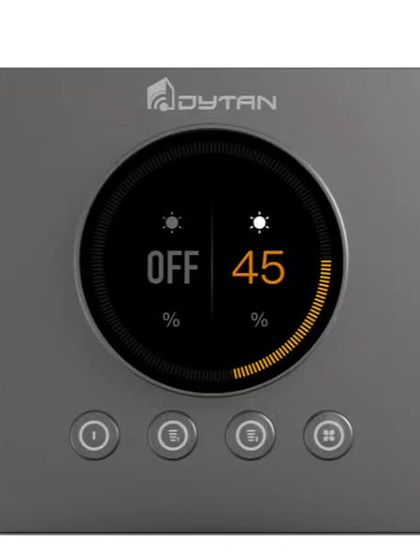 This is my smart dimmer switch. The central dial provides precise brightness control, while the surrounding buttons can be programmed to activate different lighting scenes.