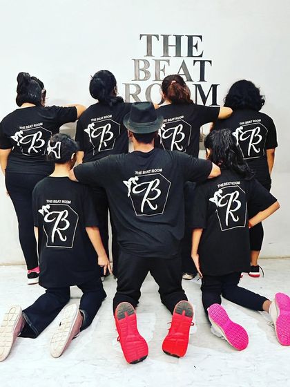 The back of our official studio t-shirt. We are one team, one family, united by our love for dance.