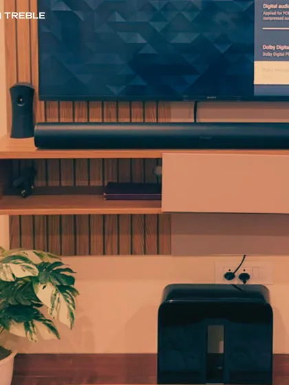 A close-up of a Sonos soundbar and wireless subwoofer. This combination provides the deep bass for movie explosions and the clear dialogue you need, all without a single speaker wire in sight.