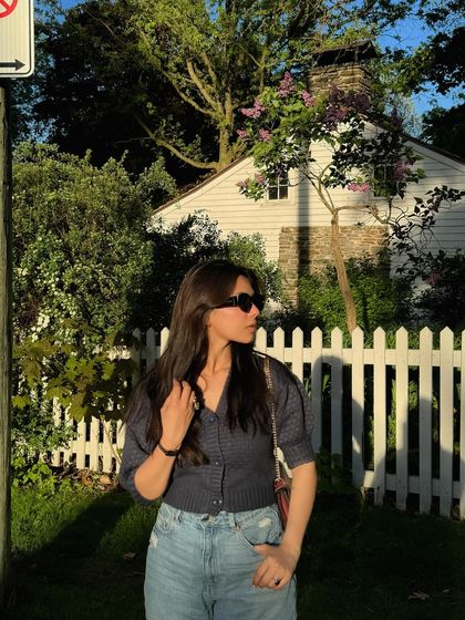 A candid, looking-to-the-side pose from the same sunny day series.