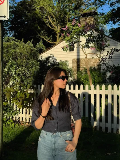 A candid, looking-to-the-side pose from the same sunny day series.