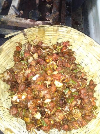 A basket full of freshly fried Chicken Stick Kebabs, a perfect and easy-to-eat starter for any event.